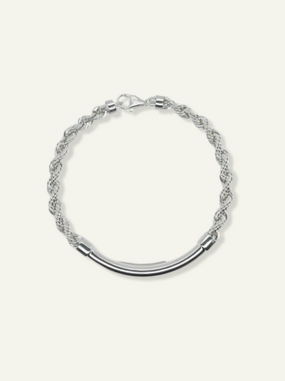 Sterling silver 4mm hollow rope bracelet with round bar design, Polished silver rope chain bracelet featuring a smooth round bar centerpiece, 4mm hollow sterling silver rope bracelet with round bar accent, displayed flat, Men’s or unisex sterling silver hollow rope bracelet with rounded bar detail, Close-up of 4mm silver hollow rope bracelet with center bar on white background.
